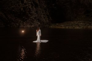 A silver long sleeved sequin Custom Bridal Wedding Dress